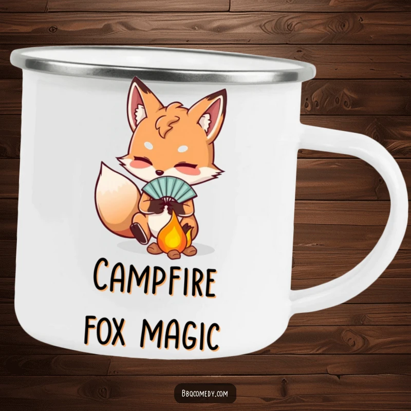 Funny determined fox fanning embers with a small fan, a sturdy camping mug for patient outdoor enjoyment.